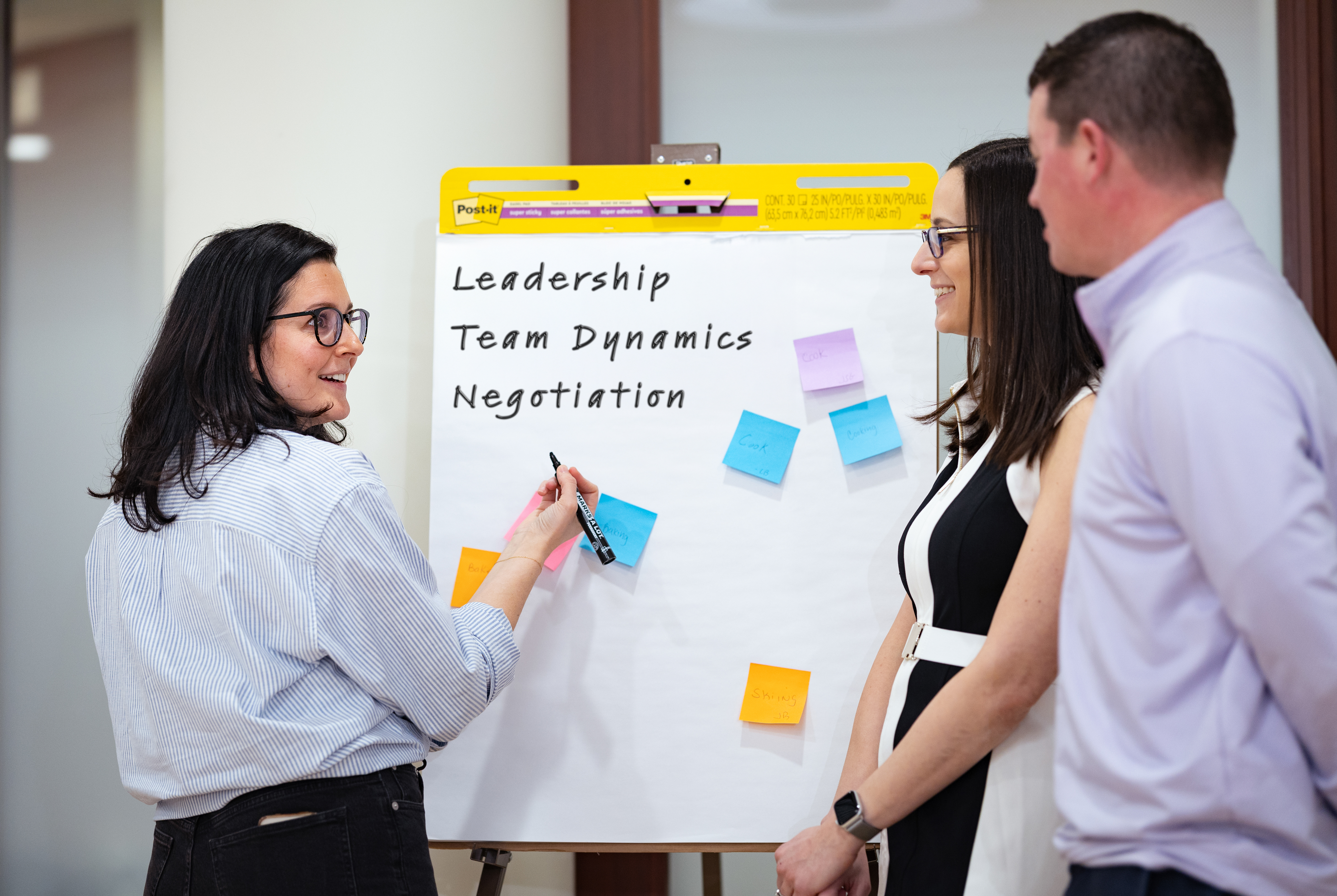 Adult learners brainstorm during a custom session with the Department of Lifelong Learning